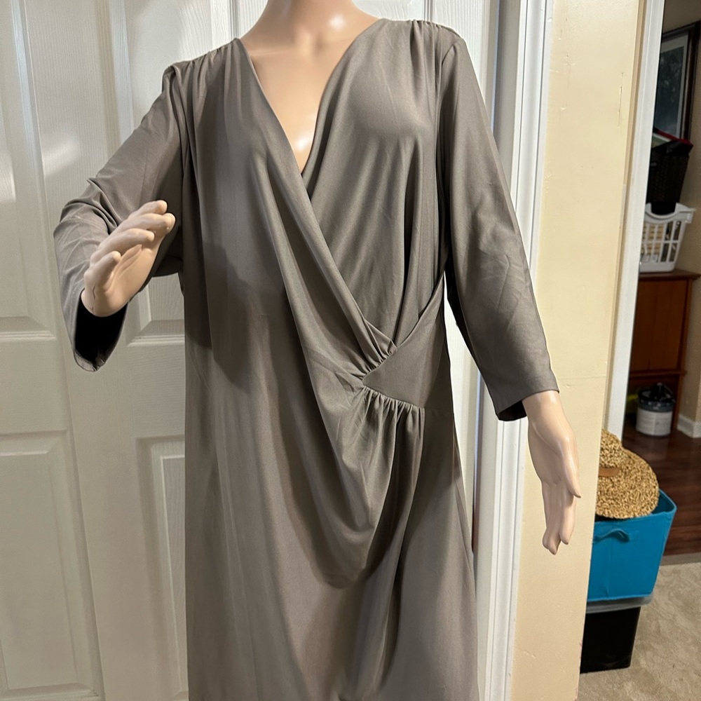 This dress was given to me by a friend as it is now too large for her.